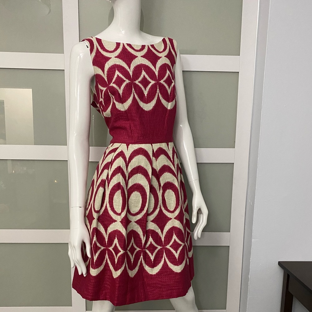 Taylor Fit an Flair dress with pockets.